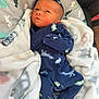 Prince is registered to the contest to win money with this photo: newborn, baby, blanket, onesie, dinosaur, infant, sleepwear, blue, cute, soft, cozy, face, headwear, fabric, pattern, child, resting, indoors, portrait, wrapped