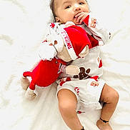 Vedish joined the competition — help win amazing prizes! baby, infant, child, teddy_bear, stuffed_toy, blanket, white_background, christmas_pajamas, holiday, festive, cute, smile, portrait, lying_down, cozy, face, hands, legs, soft_toy, plush