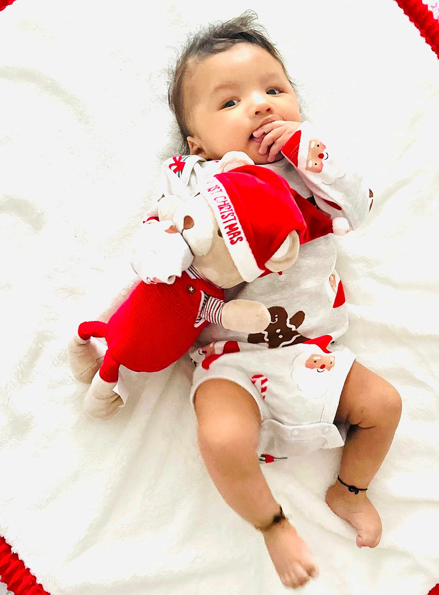 Vedish joined the competition — help win amazing prizes! baby, infant, child, teddy_bear, stuffed_toy, blanket, white_background, christmas_pajamas, holiday, festive, cute, smile, portrait, lying_down, cozy, face, hands, legs, soft_toy, plush