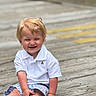 Hardin joined the competition — help win amazing prizes! toddler, child, smiling, happy, blonde_hair, white_polo, striped_shorts, sitting, wooden_deck, outdoor, cute, laughing, casual_clothing, baby, feet, socks, portrait, daylight, fun, playful