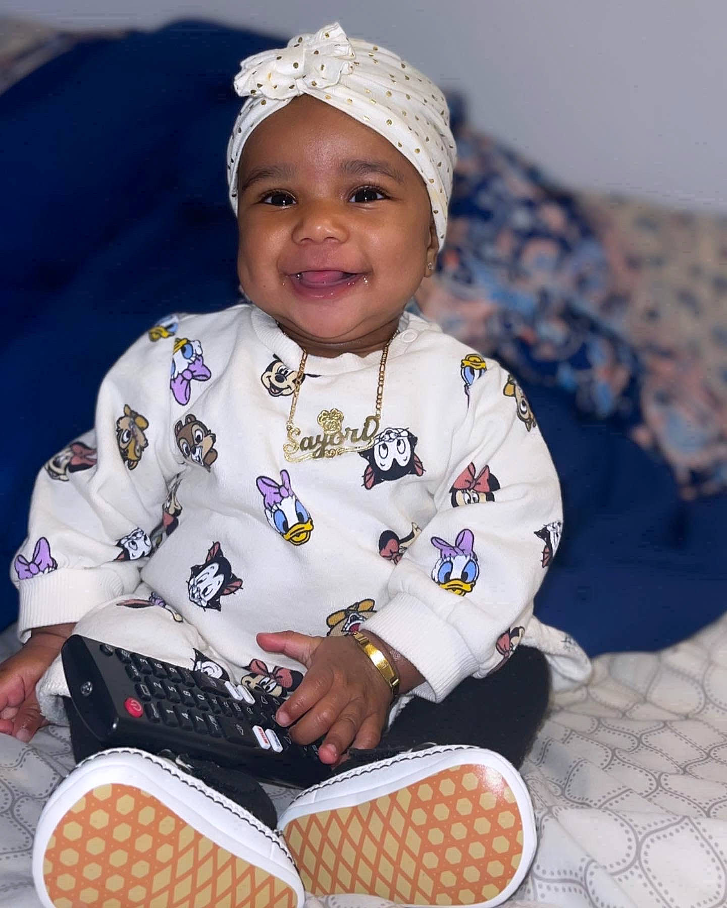 Sayori joined the competition — help win amazing prizes! baby, baby_toddler_clothing, cap, carmine, child, eye, face, fashion_accessory, fun, happy, headgear, headwear, jacket, joy, pattern, person, product, sitting, sleeve, smile