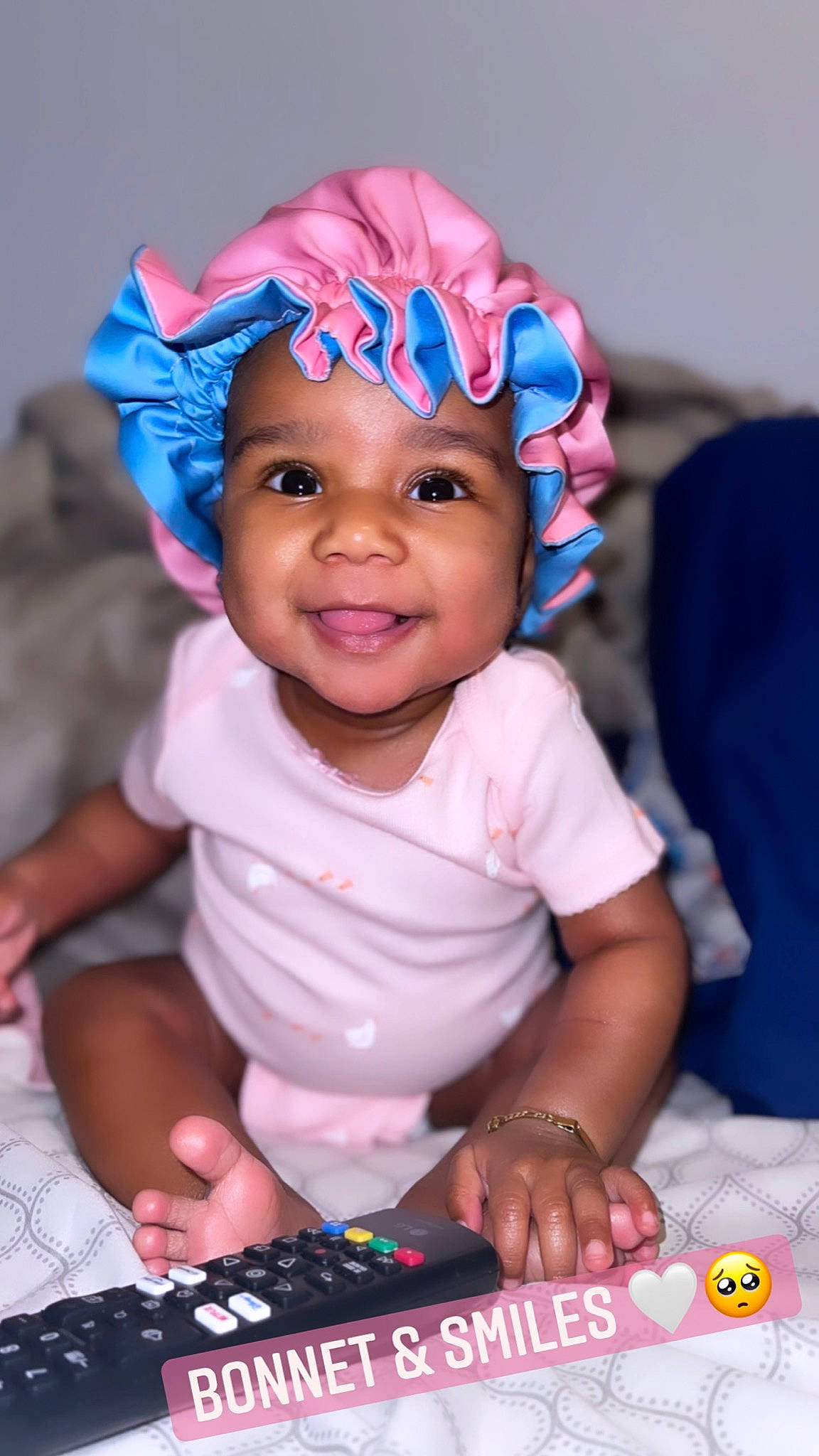 Sayori is registered to the contest to win money with this photo: baby, baby_toddler_clothing, blue, cheek, child, electric_blue, event, facial_expression, fun, happy, headwear, joy, magenta, party_supply, person, pink, purple, sitting, skin, smile
