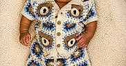 Sabir joined the competition — help win amazing prizes! baby, bear_pattern, child, crochet_outfit, curious, cushion, cute, eyes, footwear_free, hand, head, indoor, infant, lying_down, pacifier, patterned_clothing, plush, portrait, skin, soft_texture