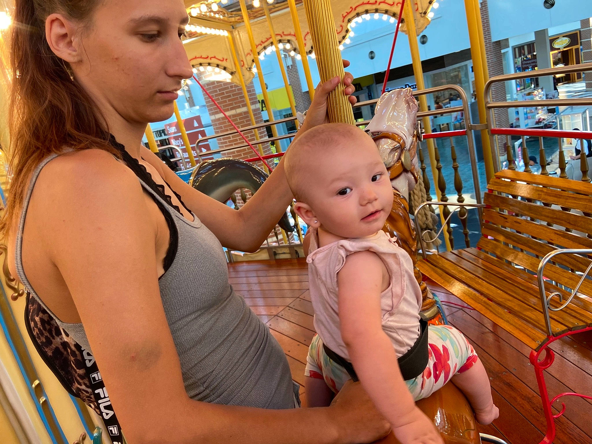 Lilyann joined the competition — help win amazing prizes! amusement_ride, baby, chest, child, event, fun, hair, happy, headwear, human_leg, jewellery, leisure, mammal, person, recreation, shelf, shorts, skin, thigh, toddler