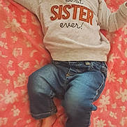 Athena joined the competition — help win amazing prizes! baby, child, sleeping, portrait, bow, headband, knitwear, long_sleeves, jeans, floral_blanket, pink, indoors, lying_down, arms_outstretched, closed_eyes, peaceful, infant, clothing, sister_shirt, cozy