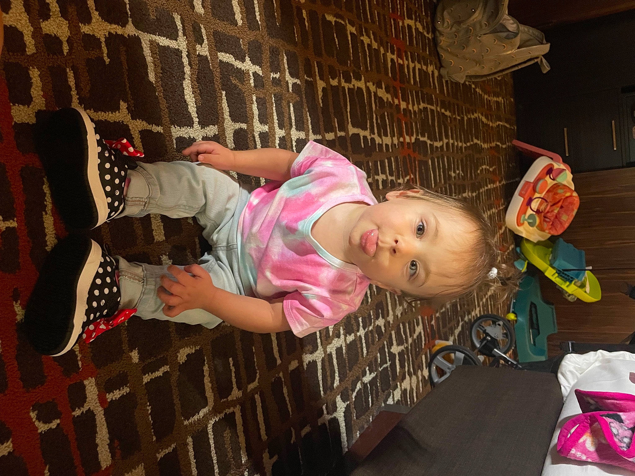 Alice is registered to the contest to win money with this photo: baby, baby_products, baby_toddler_clothing, child, fun, happy, leisure, magenta, pattern, person, pink, play, room, toddler, toy, wood