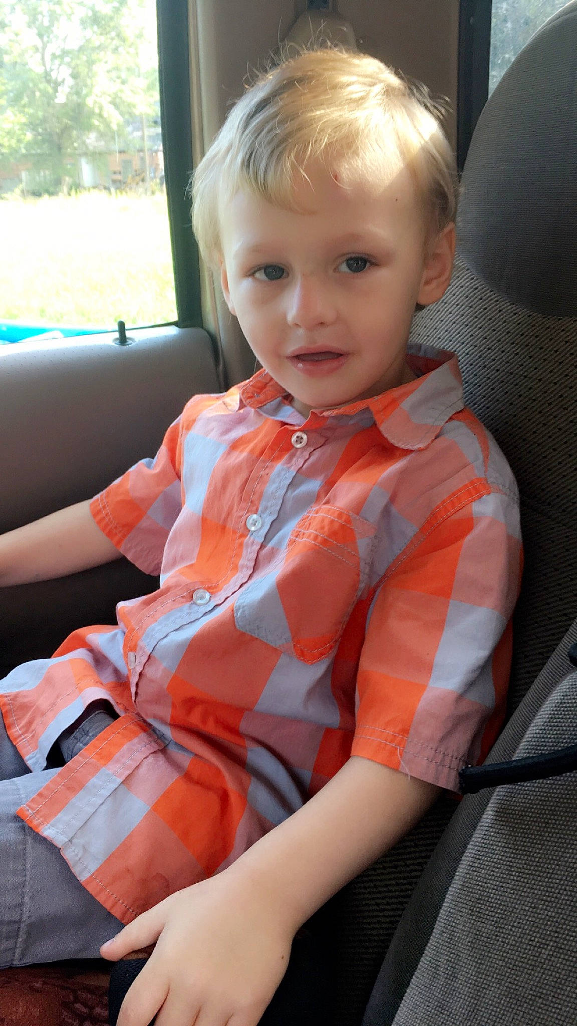 John is registered to the contest to win money with this photo: auto_part, child, orange, person, toddler