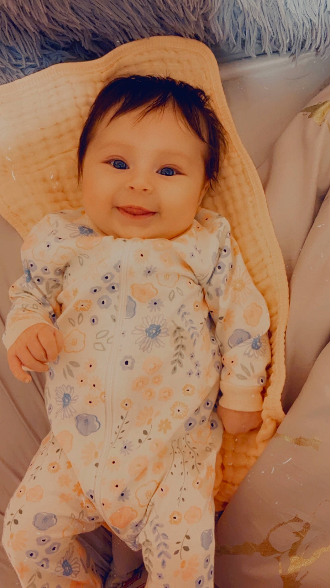 Elayna joined the competition — help win amazing prizes! baby, baby_toddler_clothing, cheek, child, comfort, eye, face, facial_expression, happy, joy, linens, lip, neck, nose, outerwear, pattern, person, skin, sleeve, smile