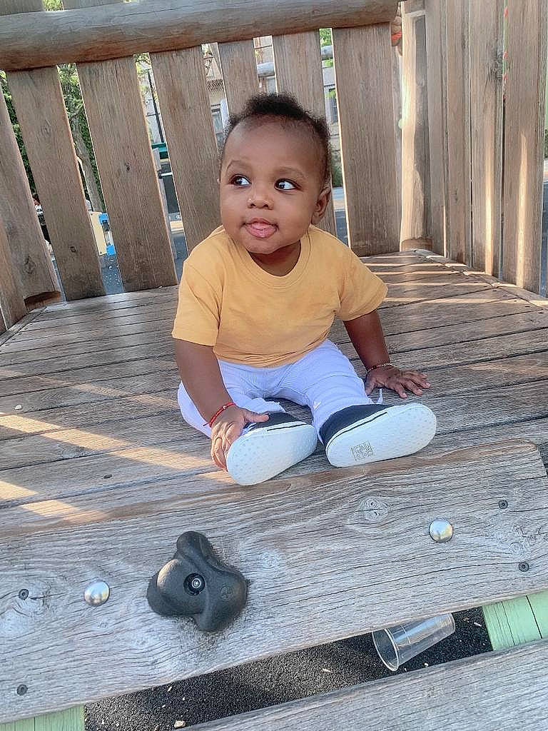 Aiden joined the competition — help win amazing prizes! baby_toddler_clothing, child, concrete, face, floor, flooring, fun, hardwood, human_leg, knee, leisure, outdoor_shoe, pattern, person, play, public_space, sitting, t_shirt, toddler, walking_shoe