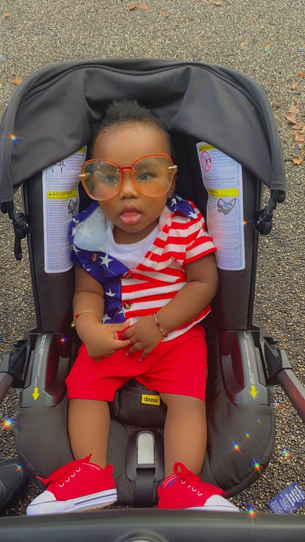 Aiden is registered to the contest to win money with this photo: auto_part, baby, baby_carriage, baby_products, bag, car_seat, child, comfort, electric_blue, eyewear, fun, human_leg, leisure, person, personal_protective_equipment, product, seat_belt, sitting, thigh, toddler