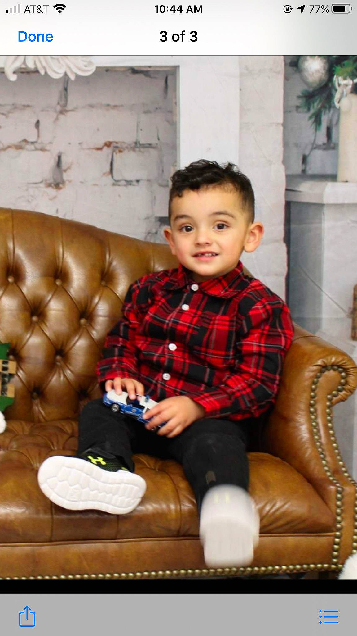Levi is registered to the contest to win money with this photo: child, child_model, couch, design, furniture, pattern, person, plaid, sitting, tartan, toddler