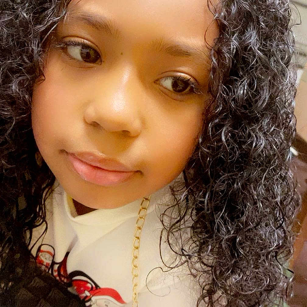 Karli joined the competition — help win amazing prizes! accessories, blackhair, child, curlyhair, dimples, earring, face, female, girl, hair, happy, head, jewelry, person, photography, portrait, smile, wig