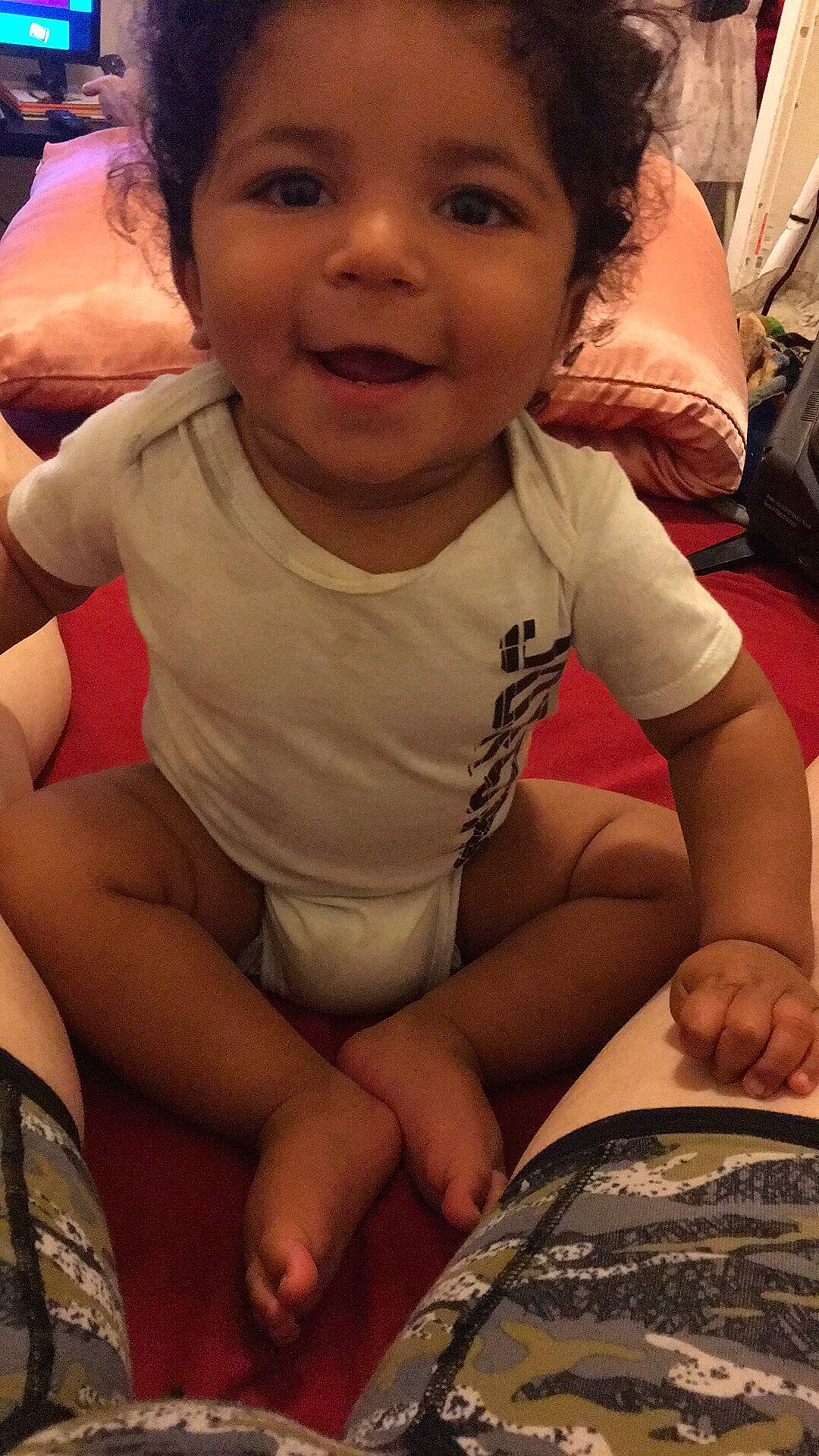 Jamarion is registered to the contest to win money with this photo: baby, cheek, child, daughter, face, joy, leg, person, sitting, skin, smile, toddler