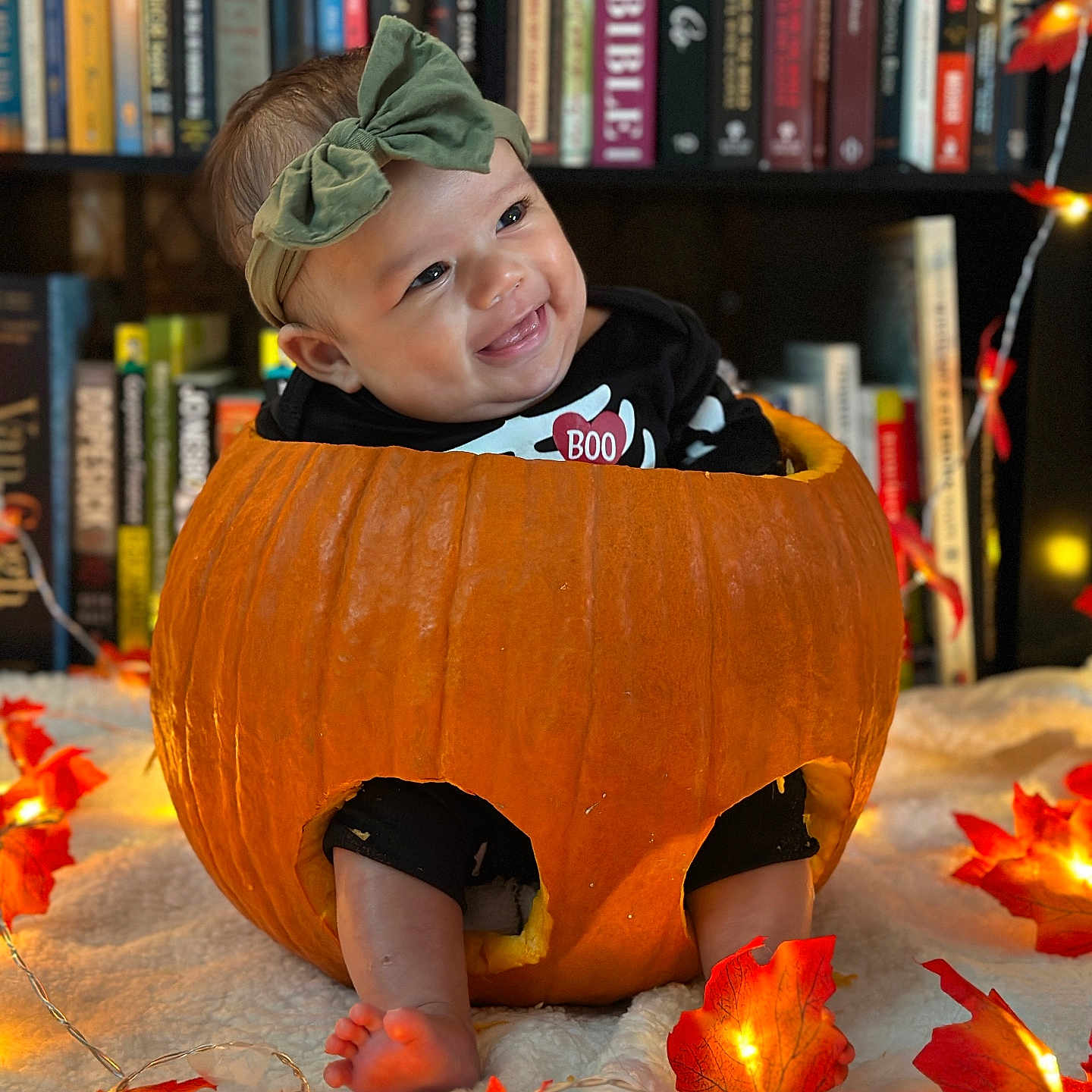 Jenesis joined the competition — help win amazing prizes! baby, book, bookcase, face, food, furniture, head, indoors, leaf, library, person, photography, plant, portrait, produce, publication, pumpkin, shelf, squash, vegetable