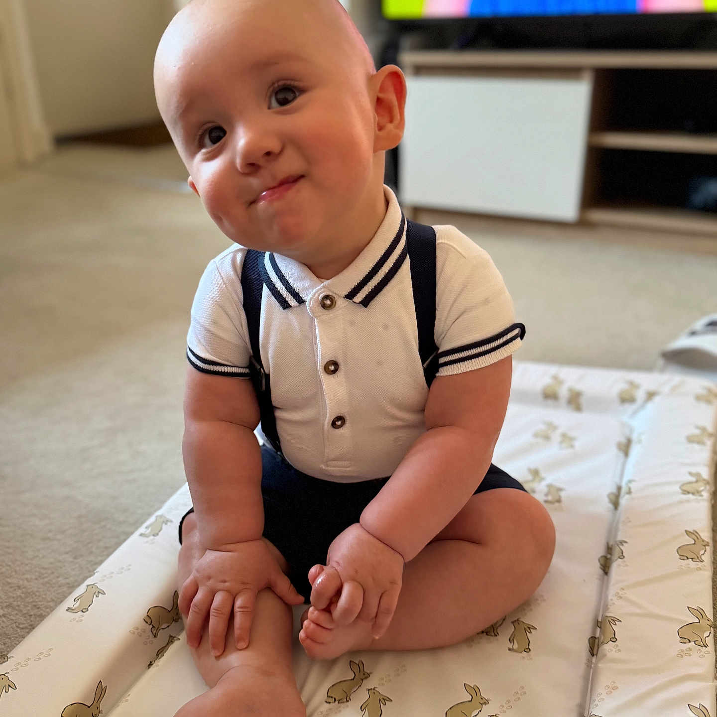 Louie is registered to the contest to win money with this photo: ankle, baby, bodypart, clothing, computerhardware, crawling, electronics, face, finger, hand, hardware, hardwood, head, monitor, person, photography, portrait, screen, shorts, sitting
