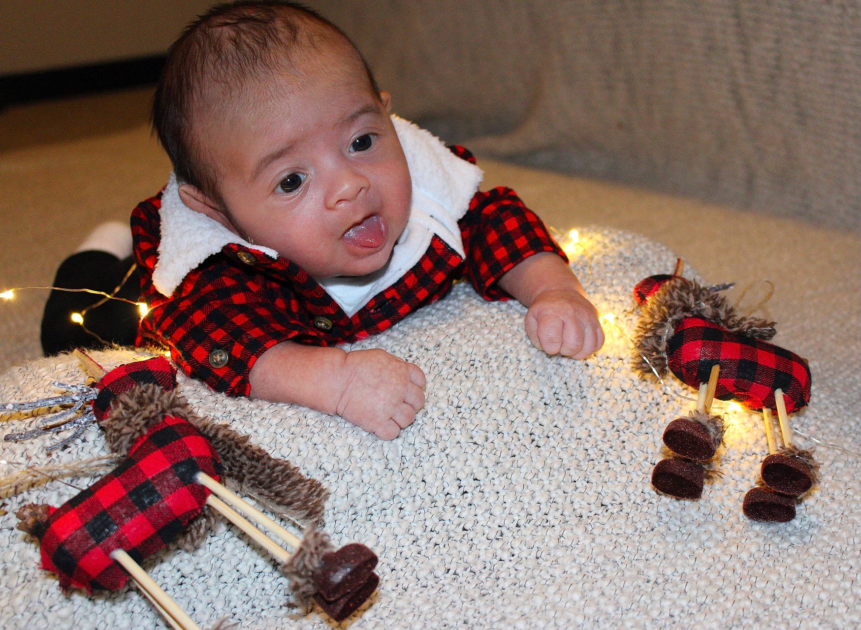 Baylor joined the competition — help win amazing prizes! baby, baby_toddler_clothing, doll, finger, flooring, fun, happy, head, nail, orange, pattern, person, plaid, product, red, sleeve, tartan, toddler, toy, wood