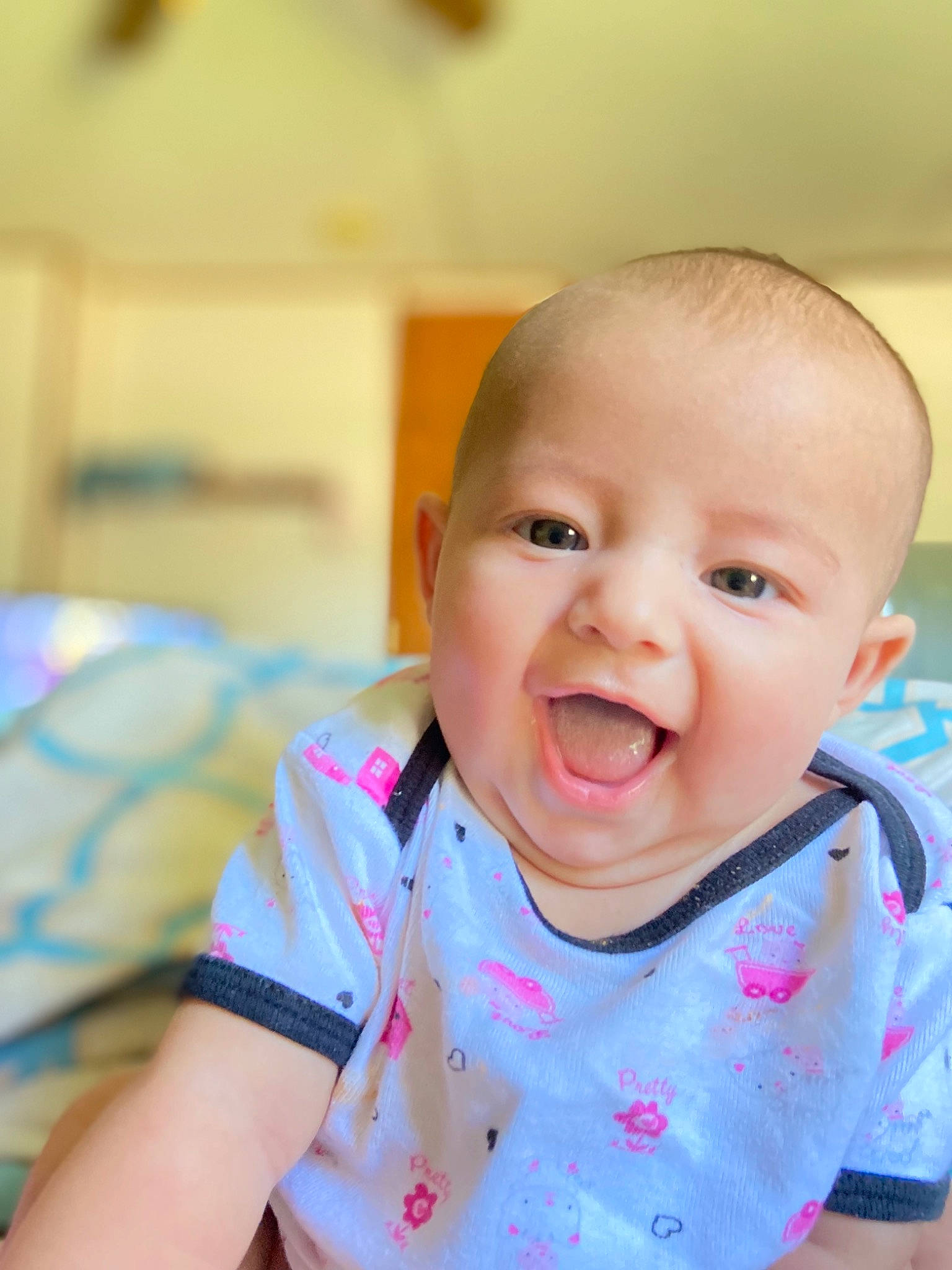 Nalicia Miamora is registered to the contest to win money with this photo: baby, baby_laughing, baby_products, baby_toddler_clothing, cheek, child, eyelash, finger, fun, happy, iris, lip, mouth, nose, person, sitting, skin, sleeve, smile, t_shirt