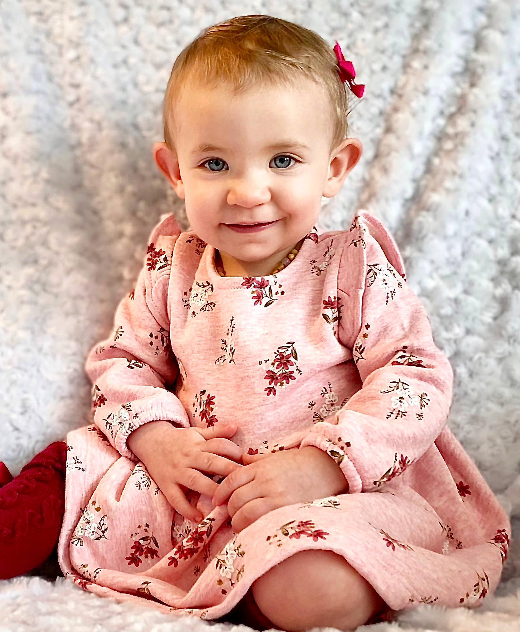 Kamiyah is registered to the contest to win money with this photo: baby, baby_toddler_clothing, blond, cheek, child, collar, dress, eye, happy, human_leg, joy, knee, lip, pattern, person, pink, skin, sleeve, smile, thigh