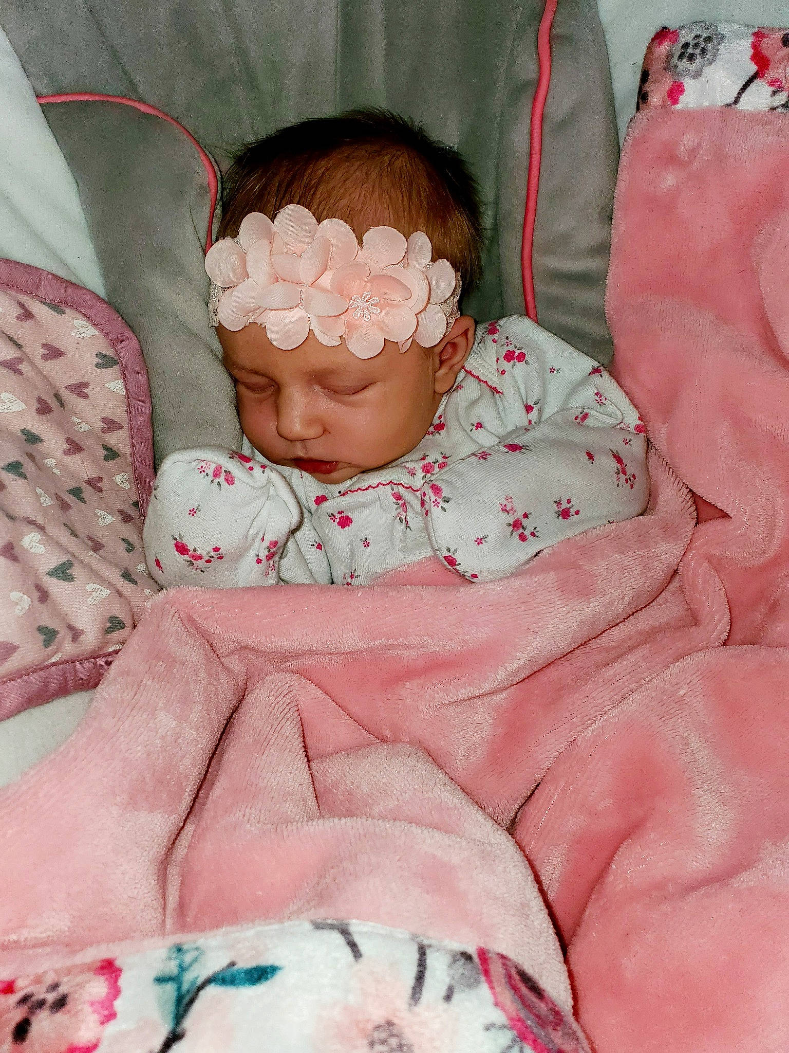 Zoe is registered to the contest to win money with this photo: baby, baby_sleeping, bedding, bedtime, birth, blanket, cheek, child, headwear, linens, person, pink, skin, textile, toddler