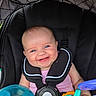 baby, smiling, car_seat, blue_eyes, infant, toy, safety_harness, child, cute, happiness, seatbelt, pink_clothing, playtime, indoor, closeup, portrait, cheerful, happy, person, baby_toy