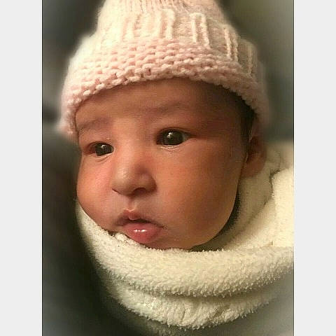 Sequoia is registered to the contest to win money with this photo: beanie, bonnet, cap, cheek, child, chin, headgear, headwear, infant, knit_cap, lip, nose, person, product, textile, wool