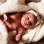 baby, blanket, bow, cozy, cute, expression, face, hand, headband, infant, lying_down, newborn, portrait, skin, sleeping, soft, texture, toddler, warm, white
