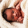 Esmée participe au concours pour gagner de l'argent avec cette photo : baby, blanket, child, closeup, cute, face, fingers, fluffy, hand, indoor, infant, lying_down, newborn, person, portrait, resting, skin, sleepy, soft, wrapped