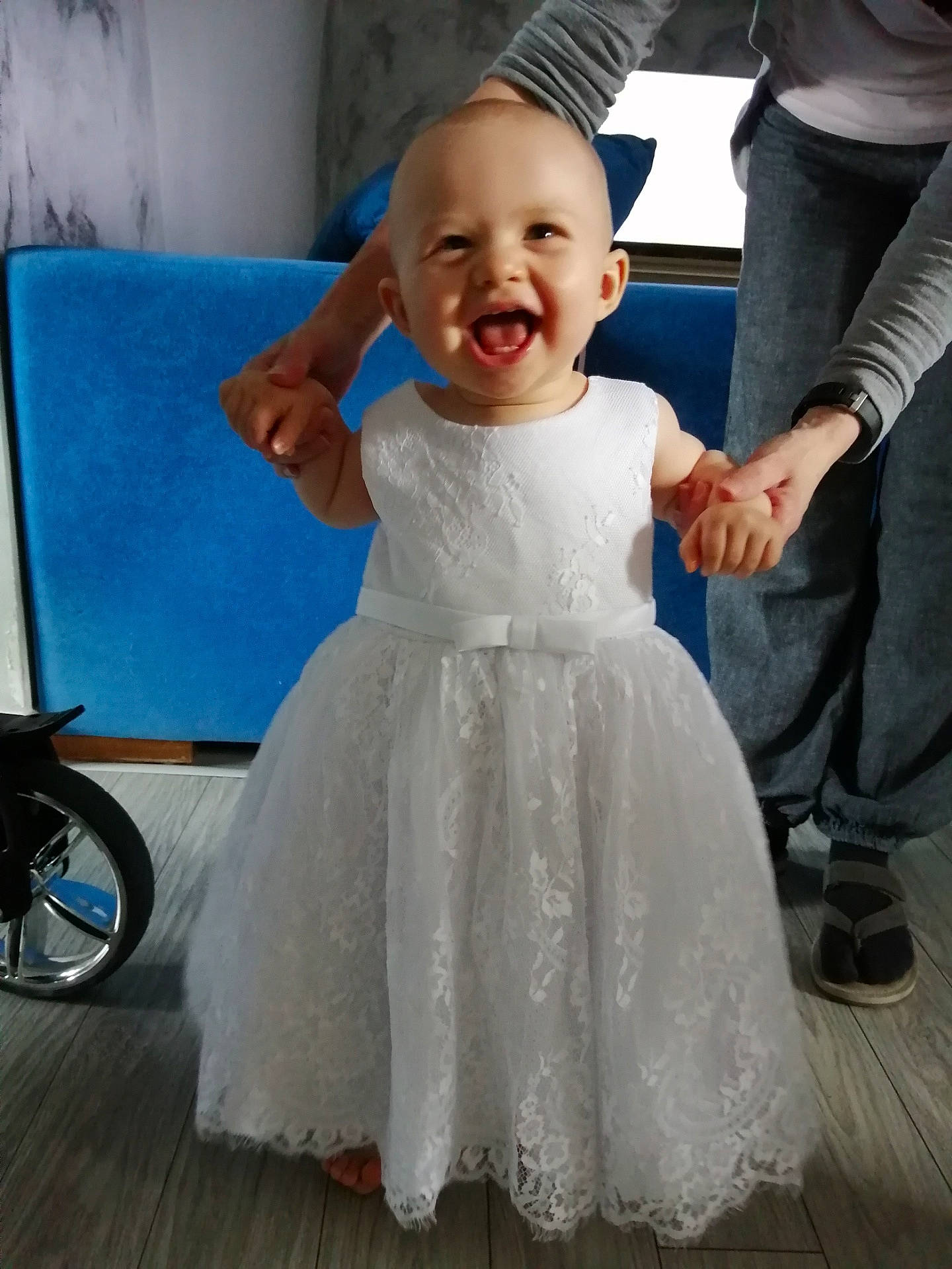 Ayline participe au concours pour gagner de l'argent avec cette photo : baby, bridal_clothing, bridal_party_dress, ceremony, child, clothing, dress, facial_expression, formal_wear, gesture, gown, happy, person, smile, toddler, wedding_dress, white