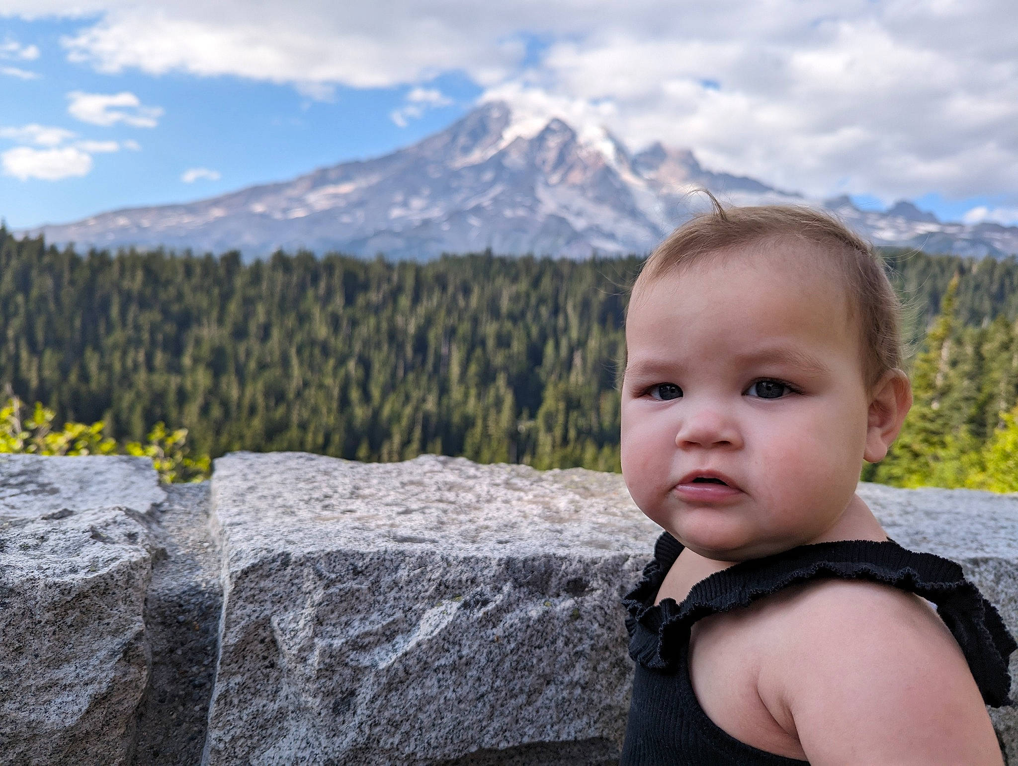 Legend is registered to the contest to win money with this photo: baby, cloud, cumulus, fell, grass, happy, head, highland, landscape, leisure, mountain, mountain_range, mountainous_landforms, people_in_nature, person, plant, sky, summer, toddler, tree