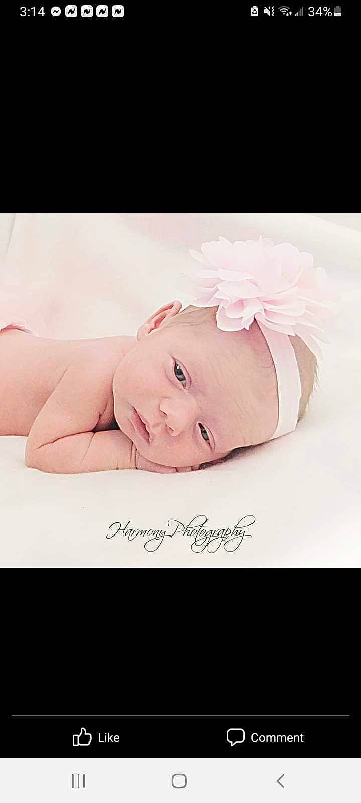 Octavia Lantz joined the competition — help win amazing prizes! baby, baby_toddler_clothing, child, comfort, eyelash, fashion_accessory, flash_photography, font, hair_accessory, happy, headpiece, iris, linens, magenta, person, petal, picture_frame, pink, skin, smile