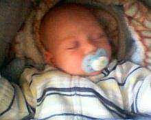 Mathéo participe au concours pour gagner de l'argent avec cette photo : baby, bedtime, birth, cheek, child, ear, eye, mouth, nap, nose, person, sleep, smile, toddler