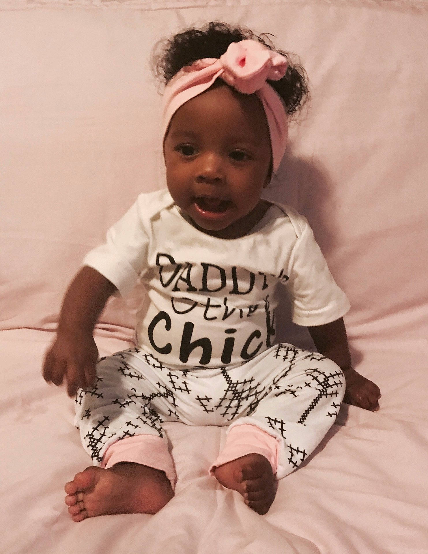 Mya Mcdaniel joined the competition — help win amazing prizes! child, design, girl, hair_accessory, headgear, headpiece, infant, pattern, person, pink, product, skin, sleeve, smile, t_shirt, textile, toddler