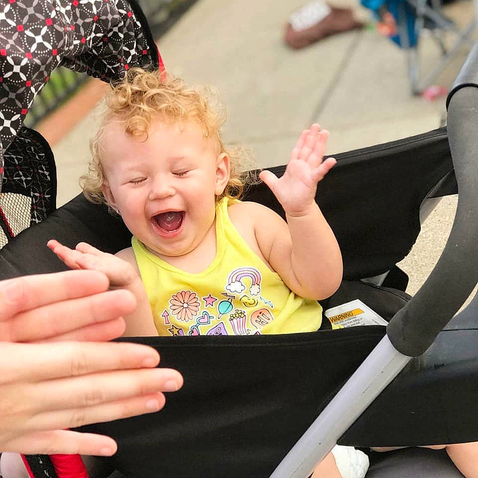 Aubrianna joined the competition — help win amazing prizes! arm, auto_part, baby, baby_carriage, baby_products, car_seat, child, finger, fun, gesture, hand, laugh, person, product, sitting, smile, toddler, vacation
