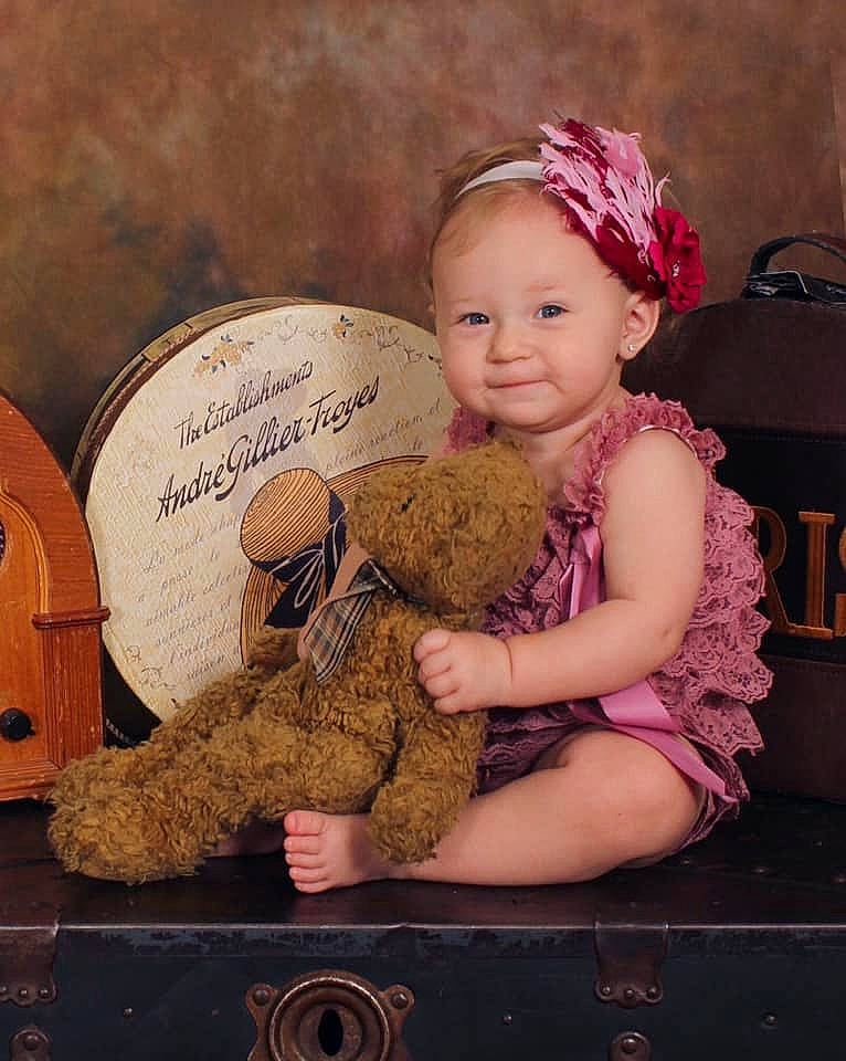 Aubrianna joined the competition — help win amazing prizes! baby, child, child_model, fawn, headgear, person, skin, smile, teddy_bear, toddler, toy