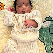 Ayan joined the competition — help win amazing prizes! newborn, baby, sleeping, white_outfit, quilted_blanket, embroidered_text, infant, peaceful, cuteness, soft_texture, hand, face, closed_eyes, lying_down, cozy, cute, child, bedtime, baby_clothes, decorative_blanket