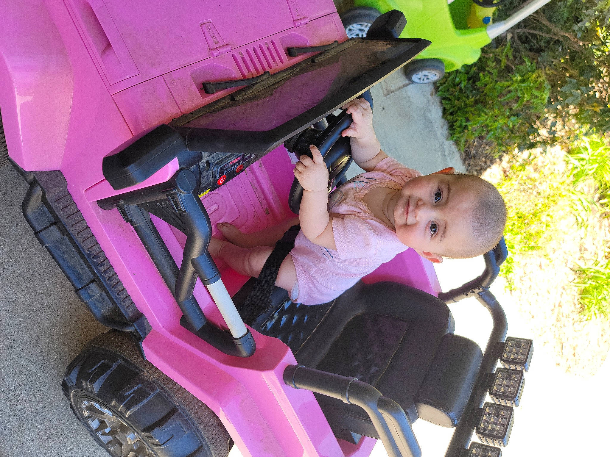Harlee joined the competition — help win amazing prizes! auto_part, automotive_design, automotive_exterior, automotive_lighting, automotive_tire, automotive_wheel_system, bumper, fender, leisure, mode_of_transport, motor_vehicle, person, pink, plant, purple, riding_toy, tire, tree, vehicle, vehicle_door