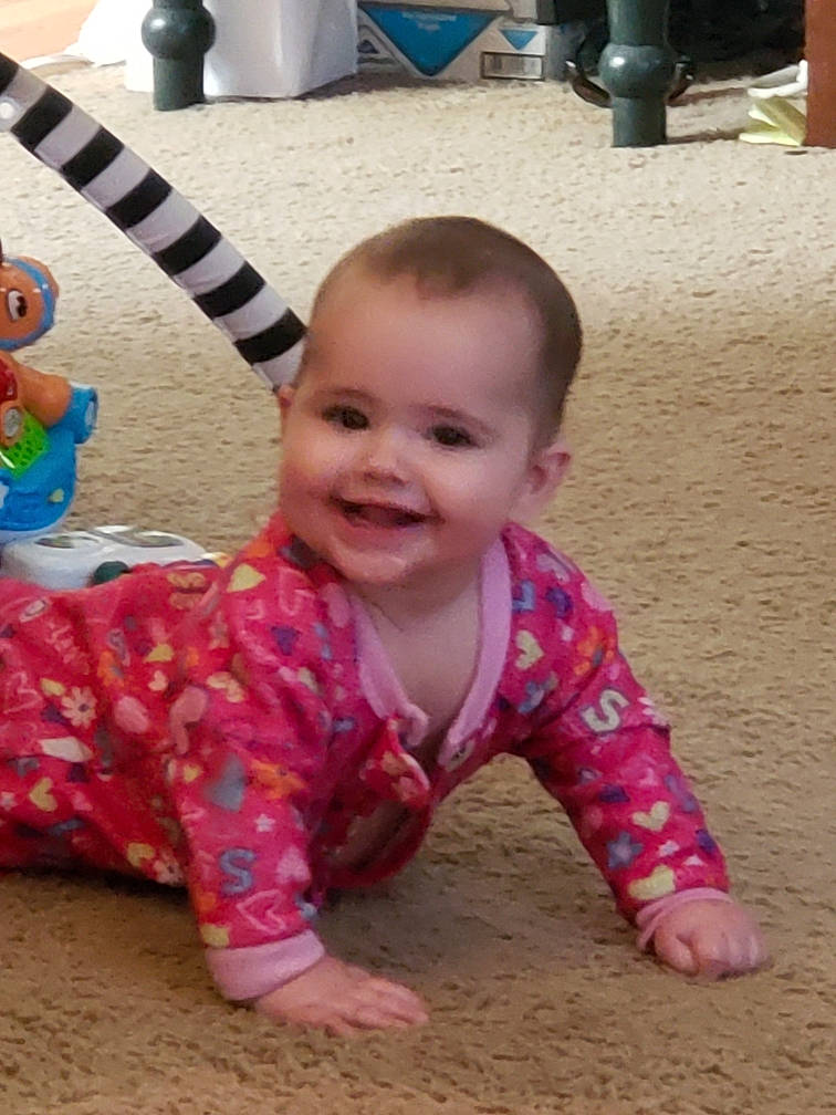 Aspyn is registered to the contest to win money with this photo: baby, baby_toddler_clothing, cheek, child, crawling, eye, face, fun, head, joy, person, pink, play, skin, smile, toddler