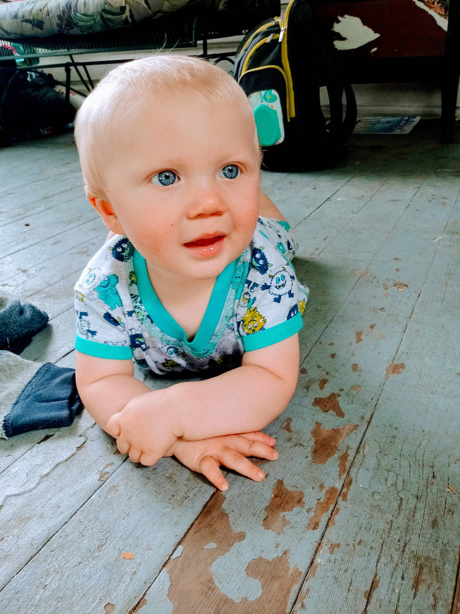 Blayne is registered to the contest to win money with this photo: baby, baby_toddler_clothing, cheek, child, cool, eye, face, floor, flooring, head, leg, lip, person, play, sitting, skin, smile, summer, toddler, vacation