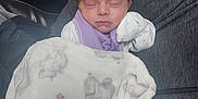 Amelia is registered to the contest to win money with this photo: architecture, baby, bed, blanket, building, clothing, couch, cushion, face, furniture, glove, head, homedecor, hospital, newborn, person, photography, portrait, quilt, sleeping