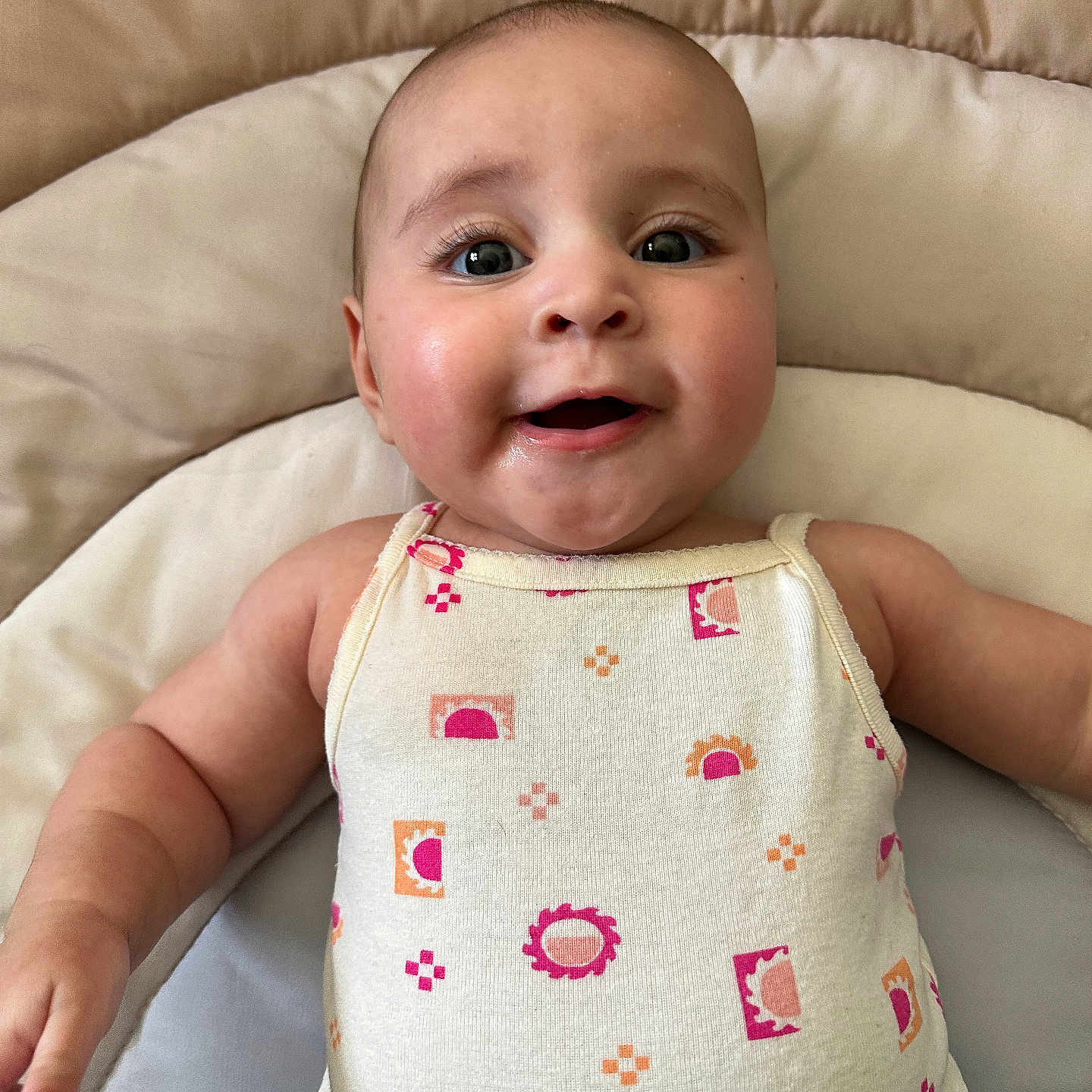 Thiri is registered to the contest to win money with this photo: applique, baby, bed, blanket, couch, crib, cushion, face, furniture, happy, head, homedecor, infantbed, newborn, pattern, person, photography, portrait, quilt, smile