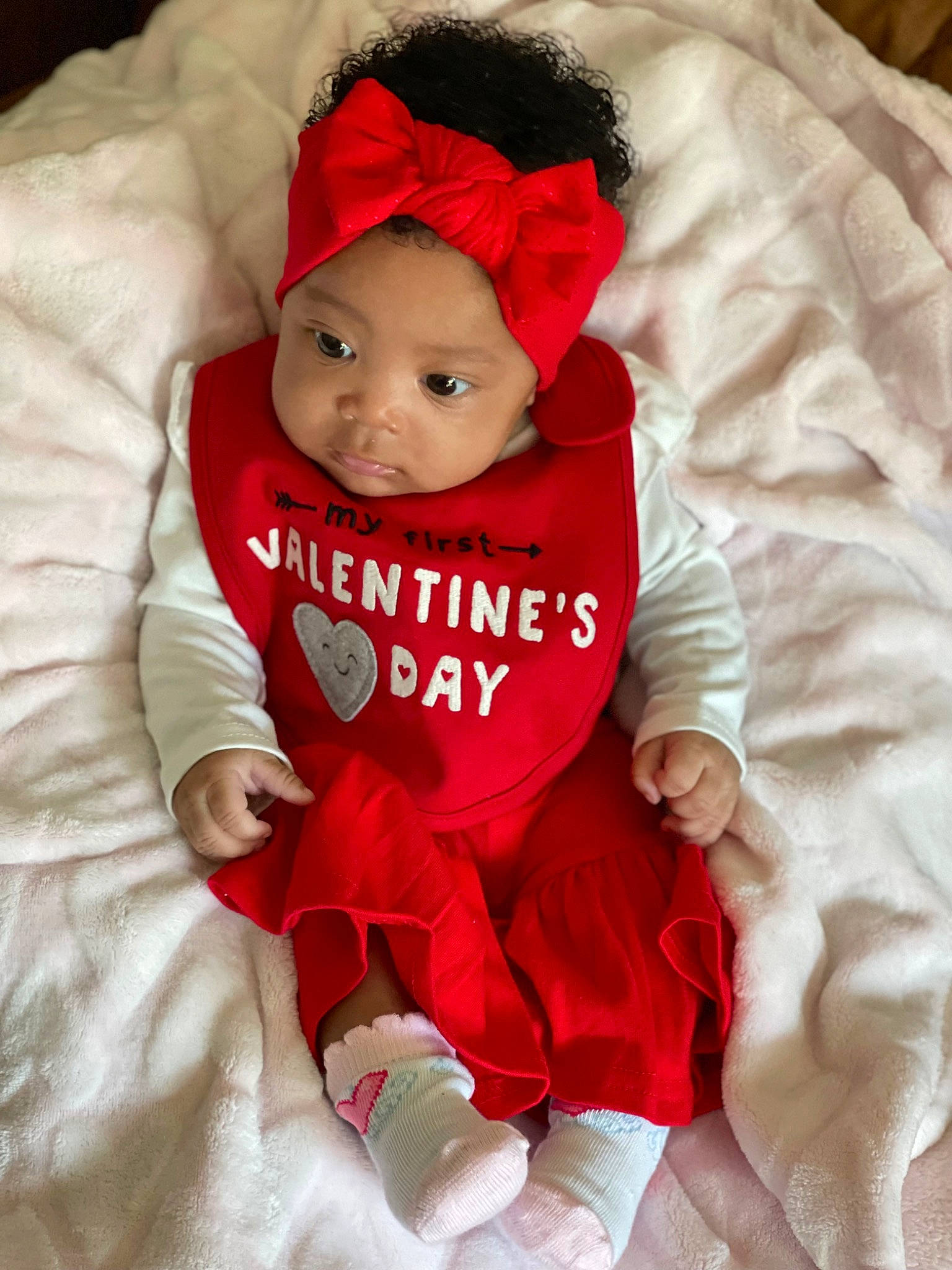 Priya is registered to the contest to win money with this photo: baby, baby_products, baby_toddler_clothing, cap, carmine, child, christmas, clothing, comfort, costume_hat, fictional_character, fur, happy, hat, headwear, linens, magenta, person, sleeve, smile