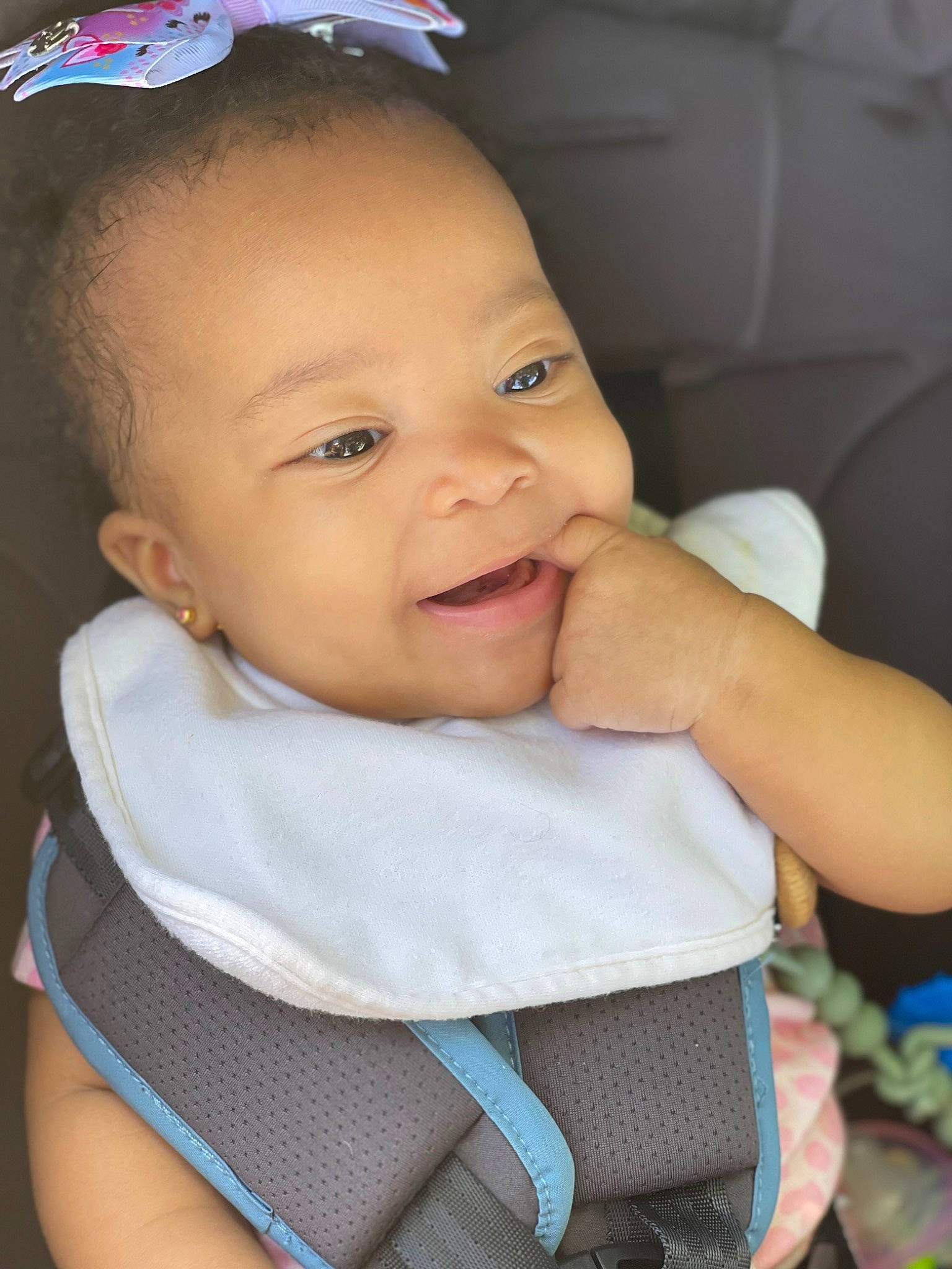 Priya joined the competition — help win amazing prizes! baby, baby_carriage, baby_toddler_clothing, beauty, cheek, child, comfort, eye, eyebrow, eyelash, face, happy, head, iris, person, seat_belt, skin, smile, textile, toddler