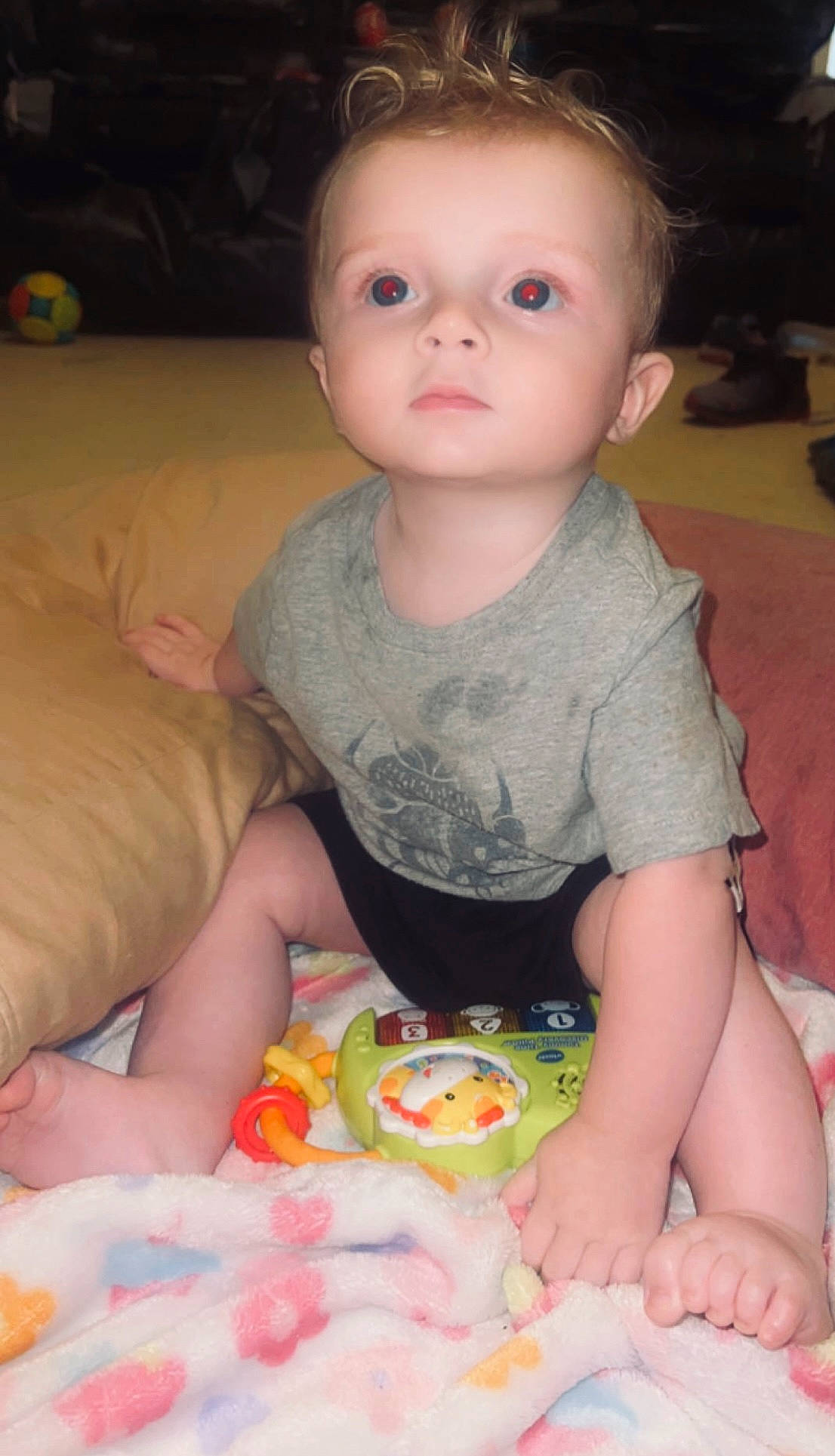 Branson is registered to the contest to win money with this photo: baby, baby_playing_with_food, baby_toddler_clothing, cheek, child, event, face, finger, food, fun, head, iris, mouth, nose, person, play, product, sitting, skin, sweetness