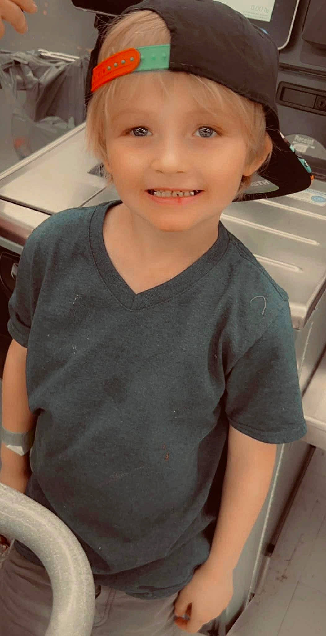 Sebastian joined the competition — help win amazing prizes! automotive_exterior, baseball_cap, bumper, cap, child, cool, eyebrow, family_car, fashion_accessory, flash_photography, forehead, fun, happy, headwear, joy, motor_vehicle, person, skin, sleeve, smile