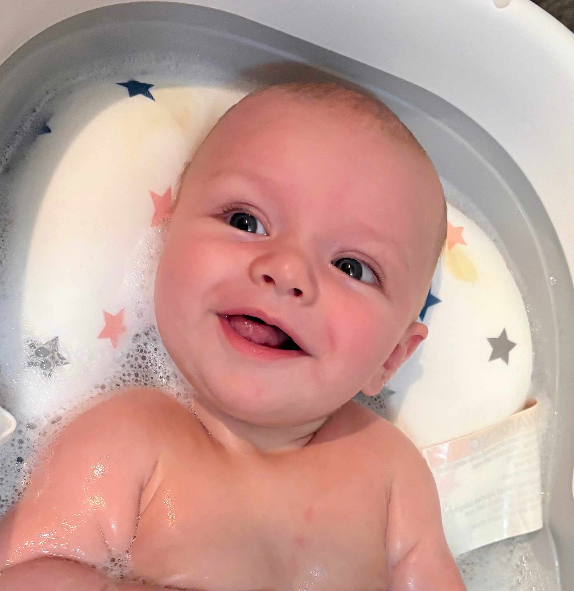 Jeremiah joined the competition — help win amazing prizes! baby, bath, water, foam, smiling, face, skin, head, child, cute, happy, star_pattern, pillow, wet, sitting, indoors, infant, expression, joy, clean