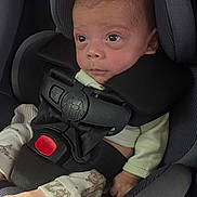 Graysen is registered to the contest to win money with this photo: baby, infant, car_seat, child, seatbelt, clothing, foot, face, head, safety, car, infant_clothing, newborn, portrait, seat, baby_seat, strapped_in, young_child, resting, indoors