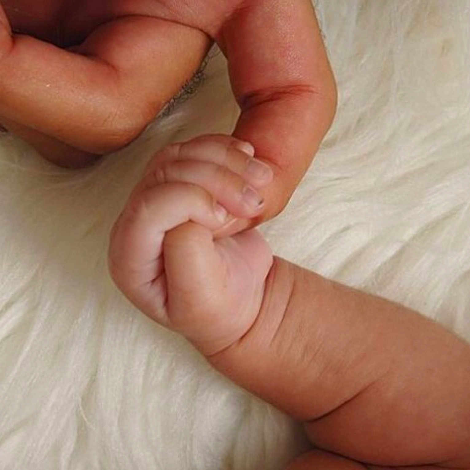 Emani joined the competition — help win amazing prizes! close_up, ear, finger, hand, infant, nail, skin, thumb