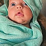 Kayden participe au concours pour gagner de l'argent avec cette photo : baby, child, face, blue_eyes, towel, hooded_towel, wrapped, close_up, skin, infant, cute, expression, portrait, soft_texture, indoor, person, newborn, warm, cozy, curious
