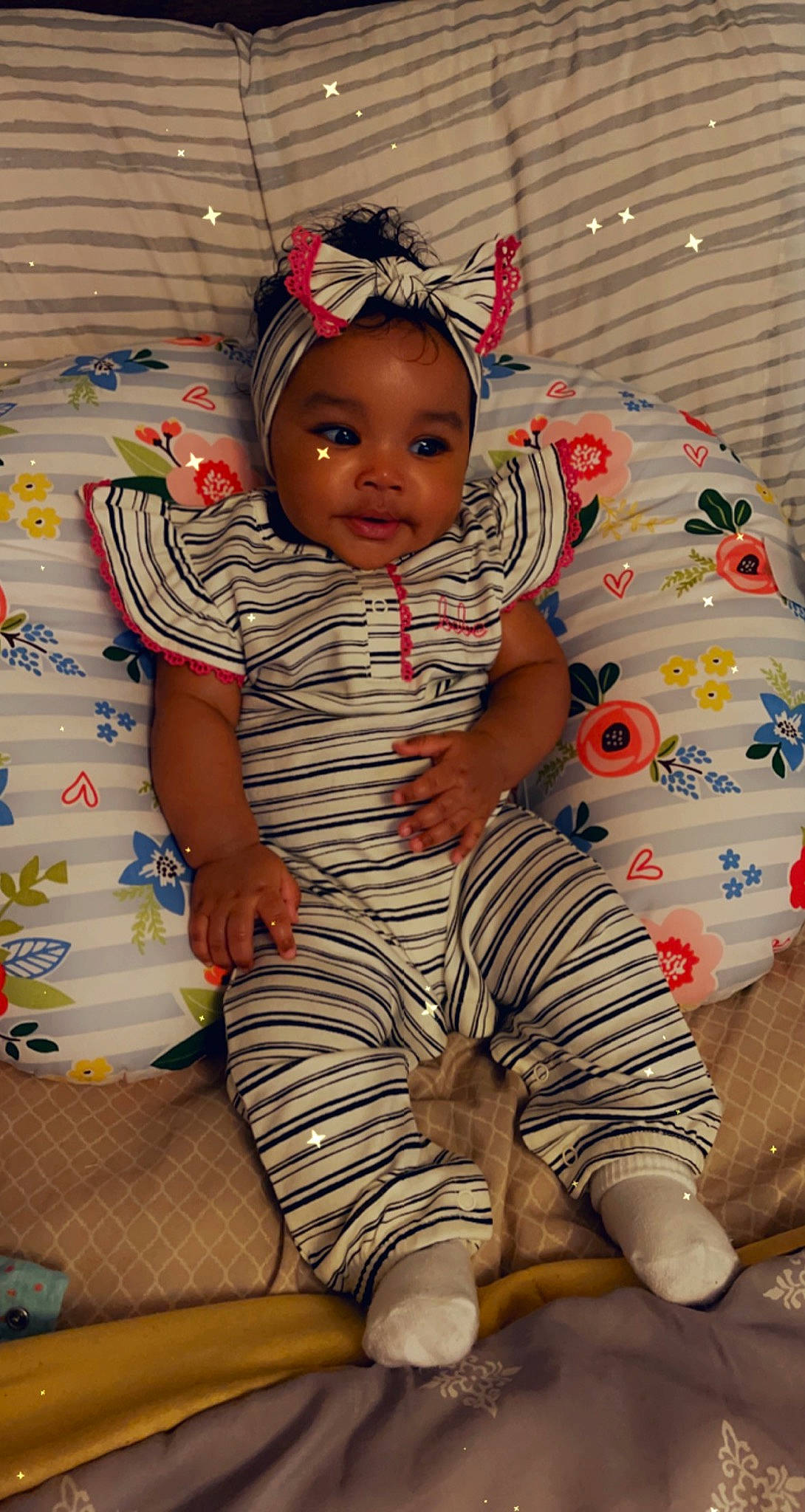 Kassidy is registered to the contest to win money with this photo: baby, baby_toddler_clothing, child, comfort, dress, face, fun, hairstyle, happy, hat, head, headgear, knee, leg, person, pink, skin, sleeve, textile, thigh