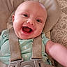 baby, baby_seat, buckle, cheeks, child, closeup, eyes, fabric_pattern, face, happy, head, infant, mouth_open, onesie, polka_dots, portrait, seat_harness, skin, smiling, strap